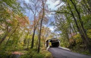 Rustic old covered bridge in the rural Pennsylvania countryside during Autumn